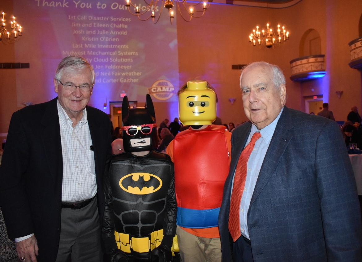 Two people with Batman and LEGO Man